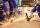 Two male workers cutting metal sheets with electric grinder in the workshop.Mechanic wear personal protective equipment(PPE) while working.Leather gloves and face shield.